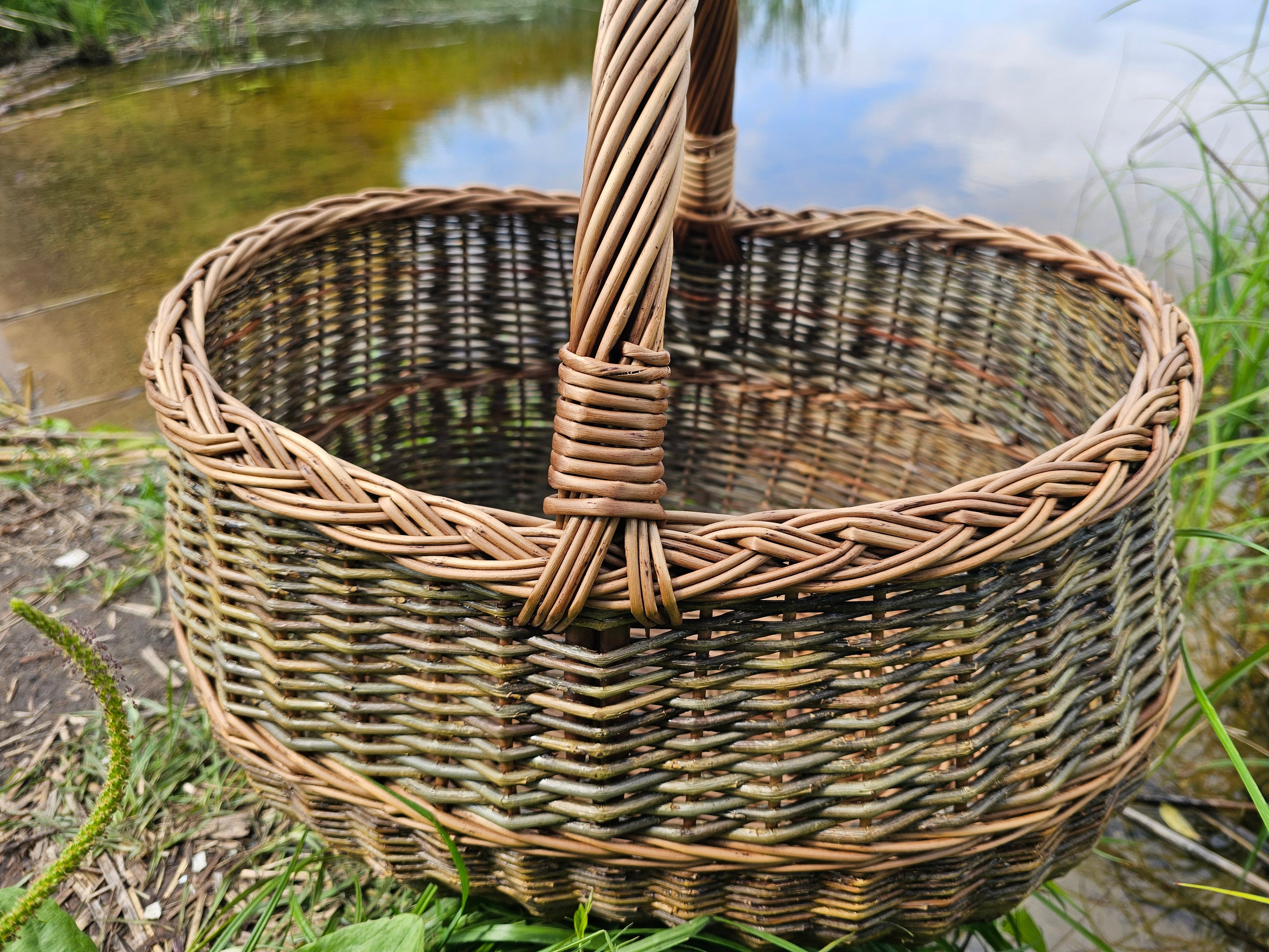 Extra Large Wicker Storage Basket — handle and rim detail